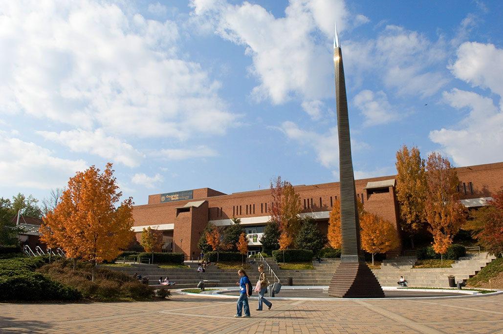 Exterior of the student center with the Campanile and fountain in the foreground