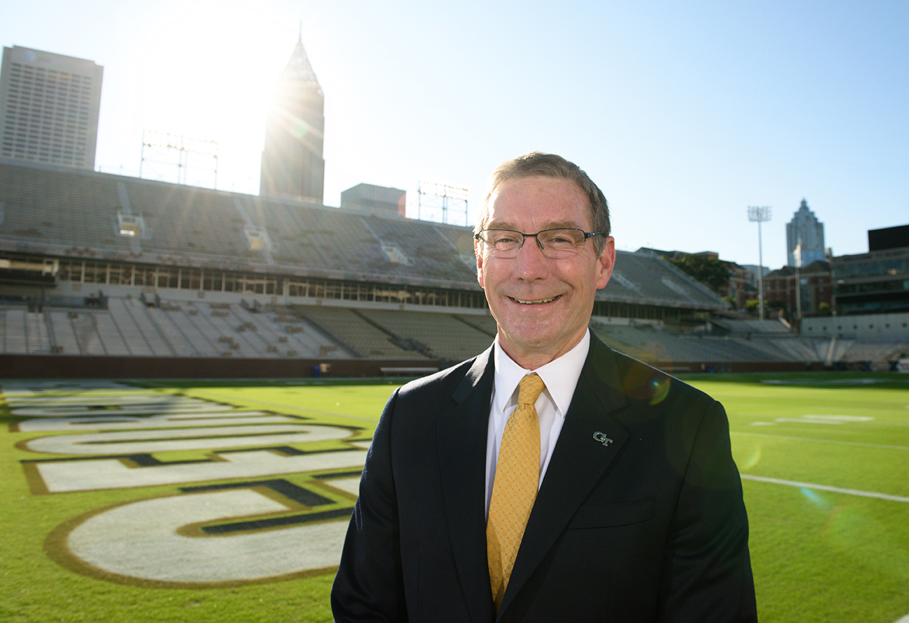 Portrait of Todd Stansbury on a sunny morning on the field inside Bobby Dodd stadium