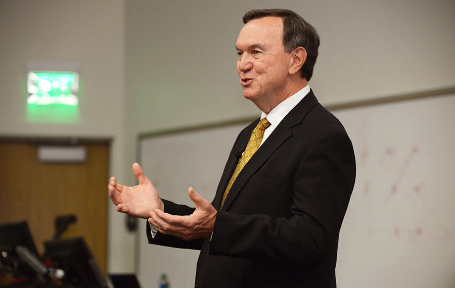 Mike Duke speaking to an audience in a Georgia Tech lecture hall