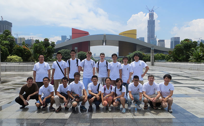 Group photo of students with Shenzhen skyline in background