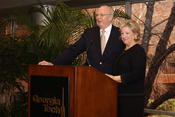 Milton and Carolyn Stewart at a Georgia Tech podium during an event