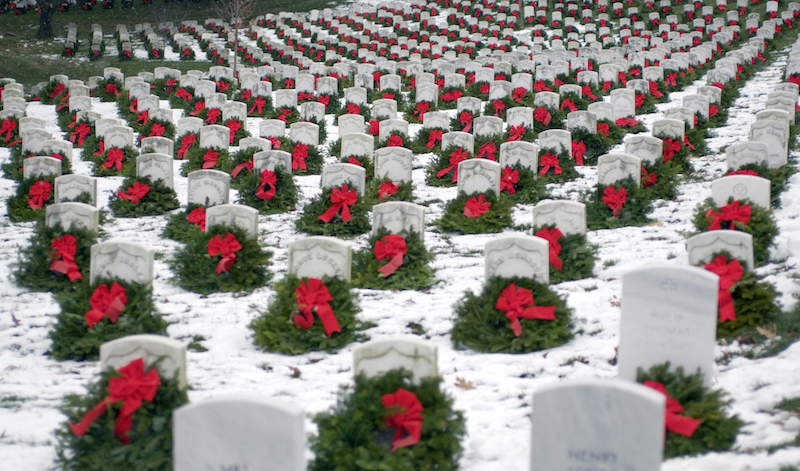 Wreaths placed on gravestones on Memorial Day in honor of those who served.